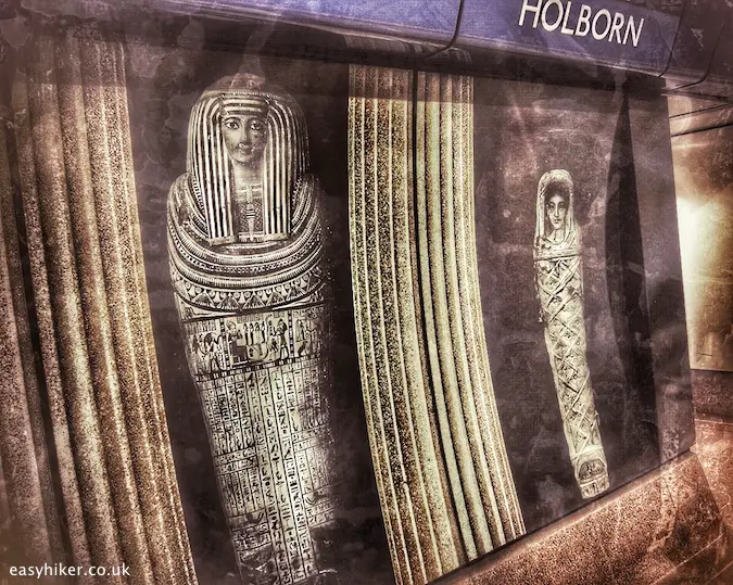 "mummy poster inside Holborn underground station"