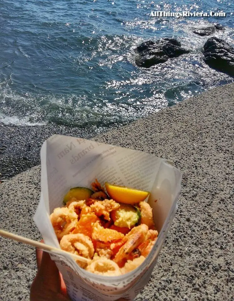 "bagful of fried seafood in Boccadasse"