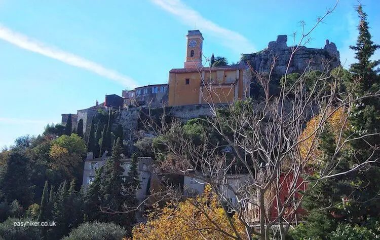 The village - Eze Hiker Conquering the Peak in the Sequel