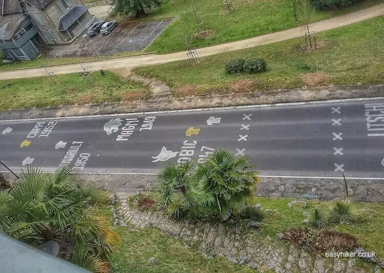 "names of cyclists on street of Pau - 1 Unique View, 2 Dynasties and 101 Champions"