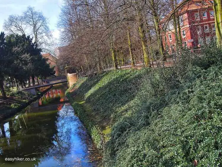 "a moat along a wall walk in Muenster"