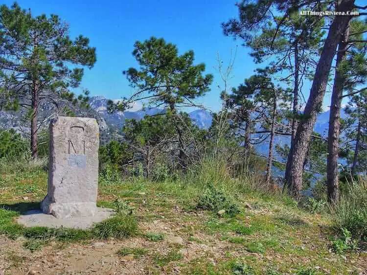 "stone marking highest point hiking the French Riviera mountains"