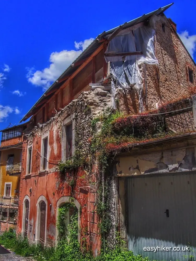 "damaged house in l'Aquila - Eagle with Broken Wings"