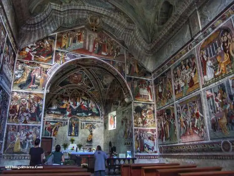 "walls with paintings inside Notre Dame des Fontaines chapel"