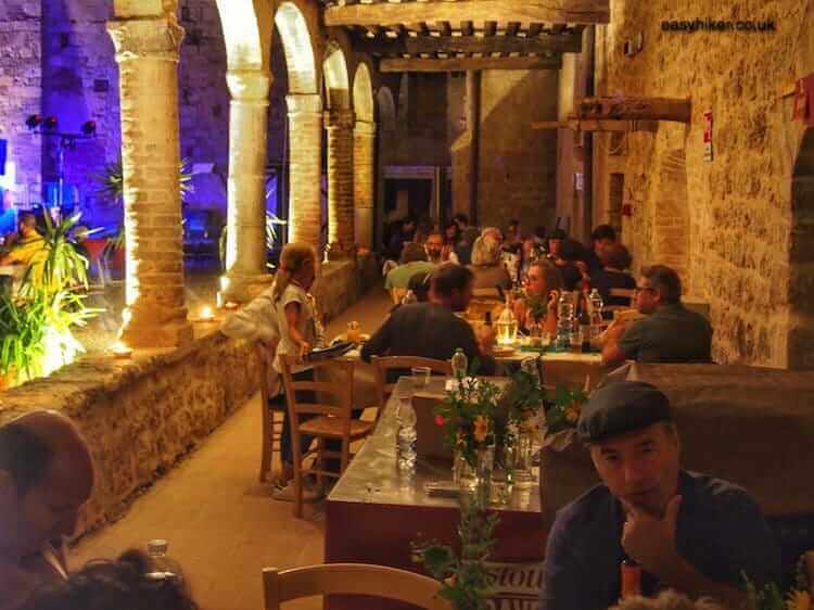 "inside the Abbadia Isola for a feast"