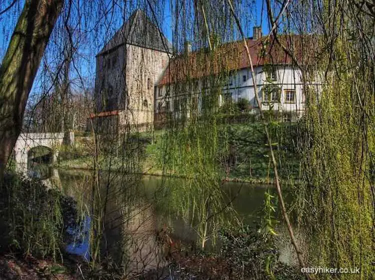 "moated Rheda Castle in Bielefeld"