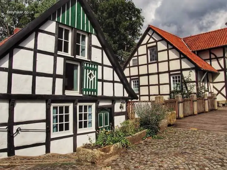"more timbered houses along the Haywain of the Teutoburg Forest" 