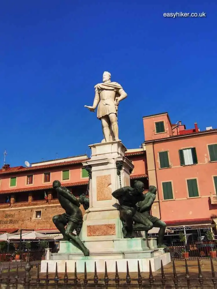 "the Four Moors statue along the Livorno Canal"